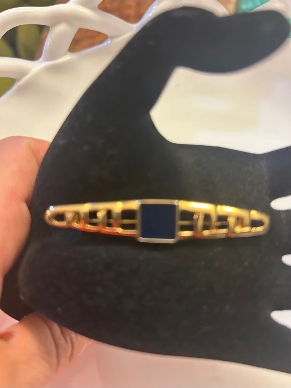 Monet vintage gold-tone tie bar features an openwork geometric design. 2 1/2”